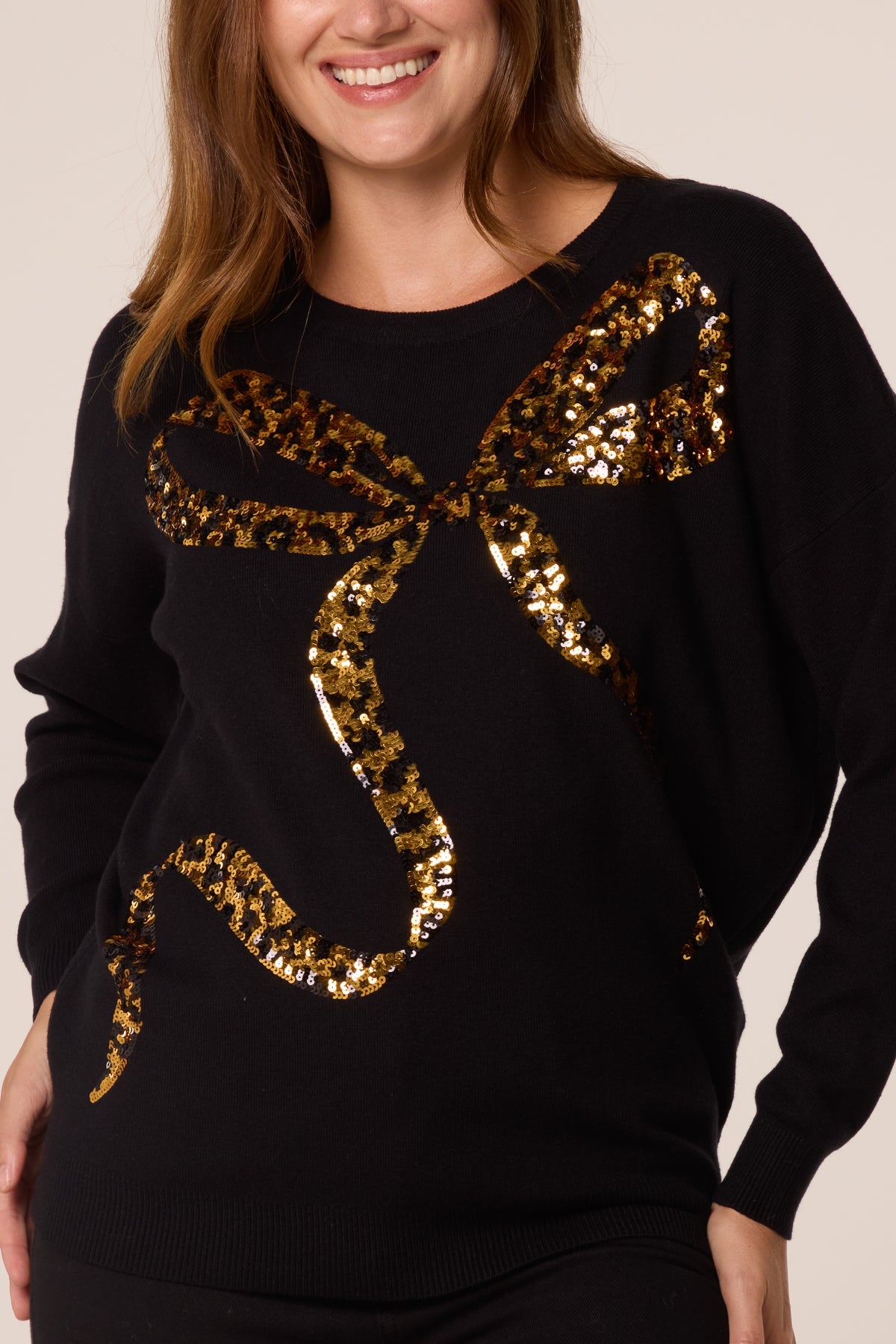 Women's Leopard Print Sequin Jumper with Bow Detail