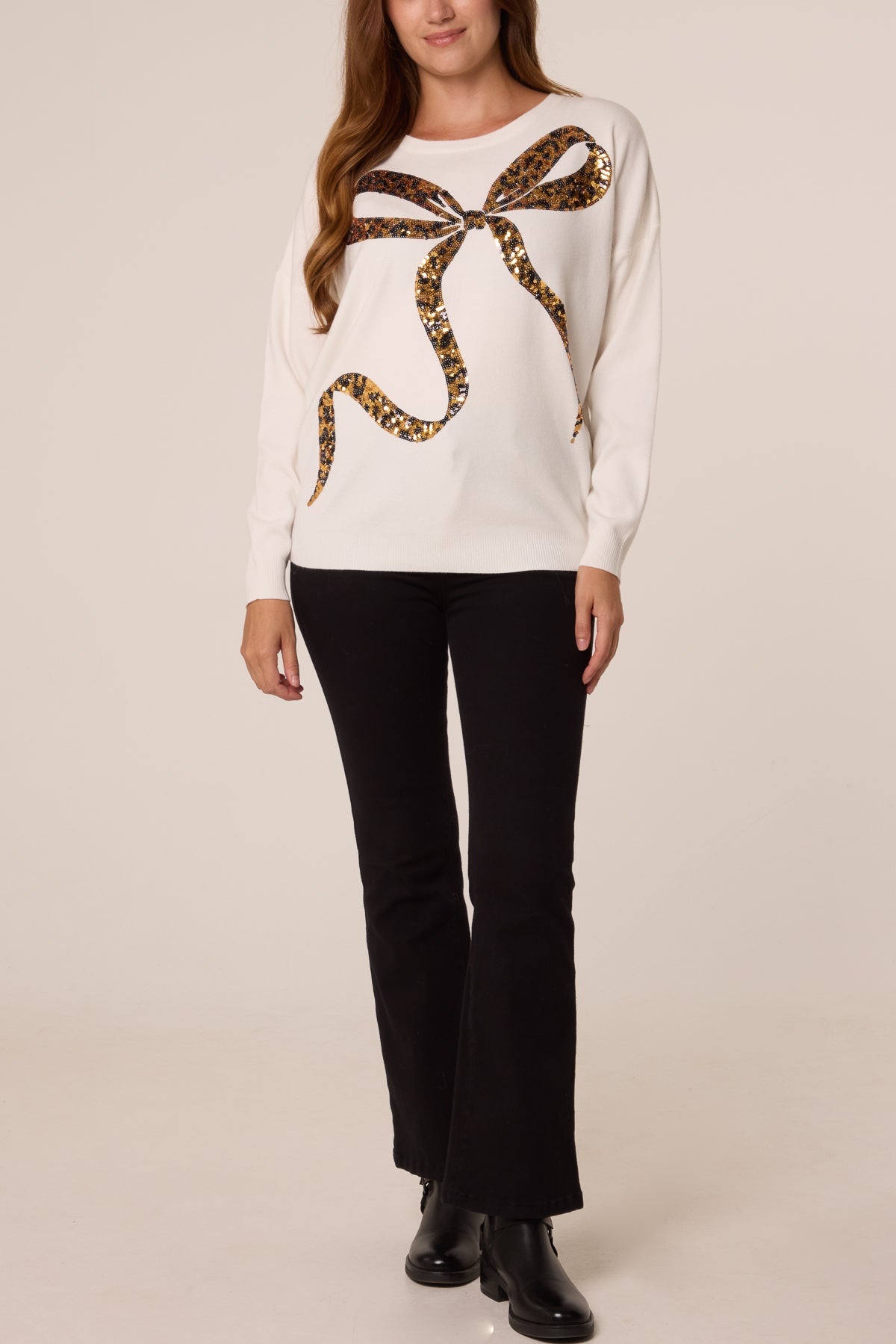 Women's Leopard Print Sequin Jumper with Bow Detail