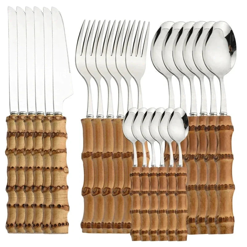 24-Piece Bamboo Handle Cutlery Set - Stainless Steel Flatware: knives, forks and spoons arranged for dining.