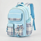 View of a stylish checkered school backpack featuring padded shoulder straps and a spacious compartment, showcasing its comfort and practicality