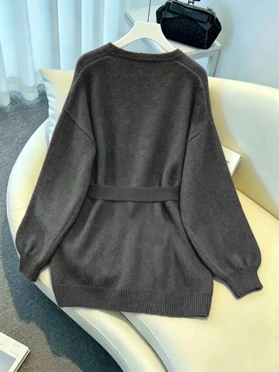 Oversized cardigan met riem