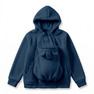 Parent wearing the fleece baby carrier hoodie with baby secured in the zip-in kangaroo pouch