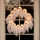 Light-Up Ghost Halloween Wreath with 12 LED Ghosts