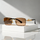 Women's Sunglasses with Rimless Diamond-Cut Lenses and Panther Temple Detail