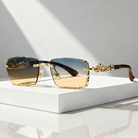 Women's Sunglasses with Rimless Diamond-Cut Lenses and Panther Temple Detail