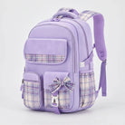 View of a stylish checkered school backpack featuring padded shoulder straps, a spacious compartment, and a durable fabric exterior