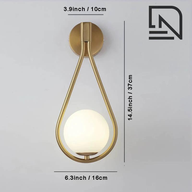 DARBE - Nordic Brass Wall Light, Frosted Glass Globe Design; wall-mounted fixture with brass teardrop frame.