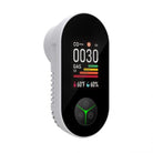 Digital gas detector with a black screen displaying readings on a white background