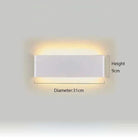Minimalist aluminium LED wall light with up and down lighting; white rectangular fixture on wall.