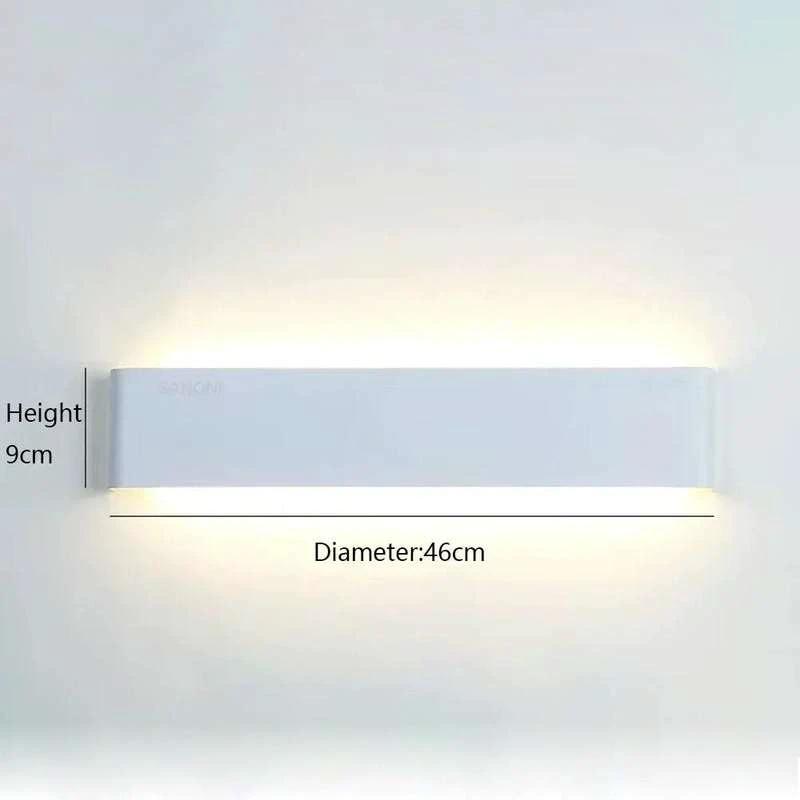 Minimalist aluminium LED wall light, white finish, wall-mounted with upward and downward glow.