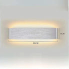 Minimalist Aluminium LED Wall Light with up and down lighting mounted on bedroom wall