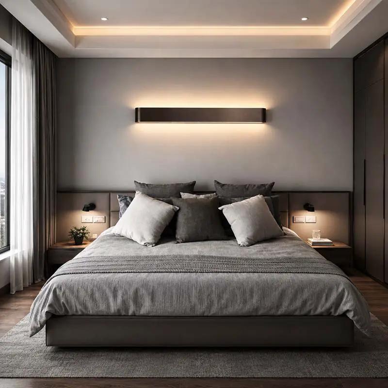 Minimalist LED Wall Light – Aluminium Up & Down Wall Lamp; wall-mounted bedside ambient lighting above the bed in the bedroom.