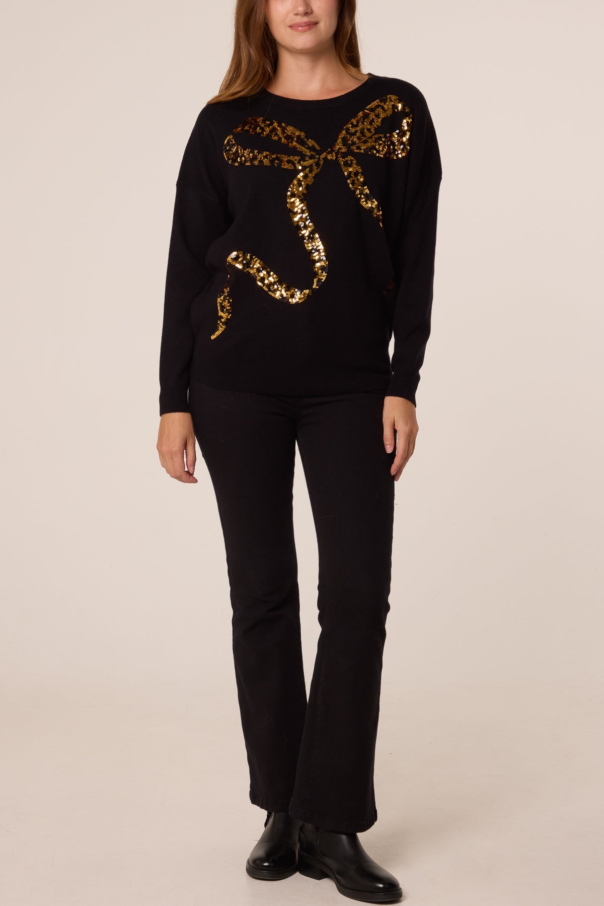 Women's Leopard Print Sequin Jumper with Bow Detail