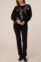 Women's Leopard Print Sequin Jumper with Bow Detail