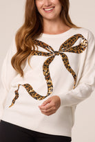 Women's Leopard Print Sequin Jumper with Bow Detail