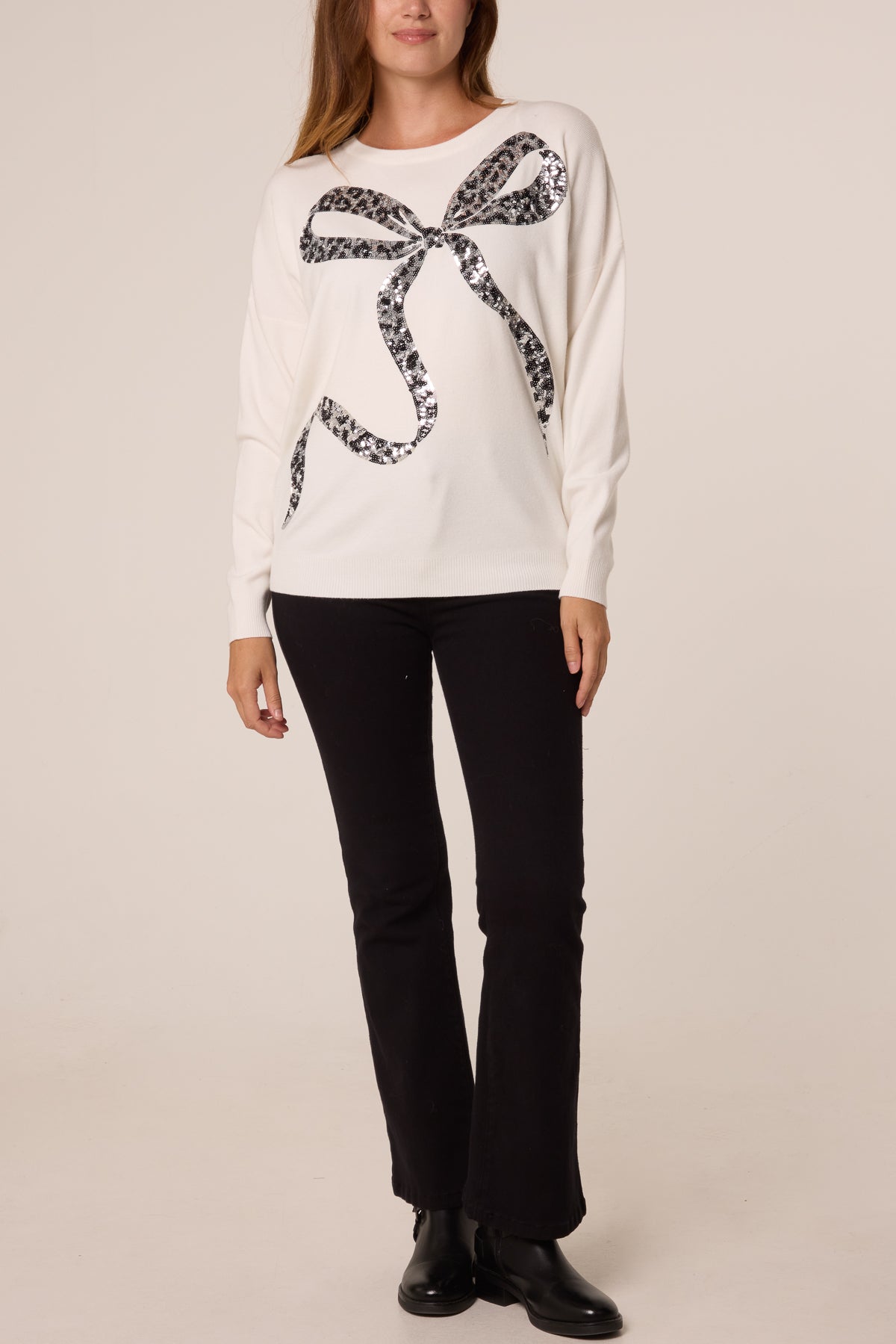 Women's Leopard Print Sequin Jumper with Bow Detail