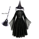 Black gothic lace dress with witch hat and toy broom