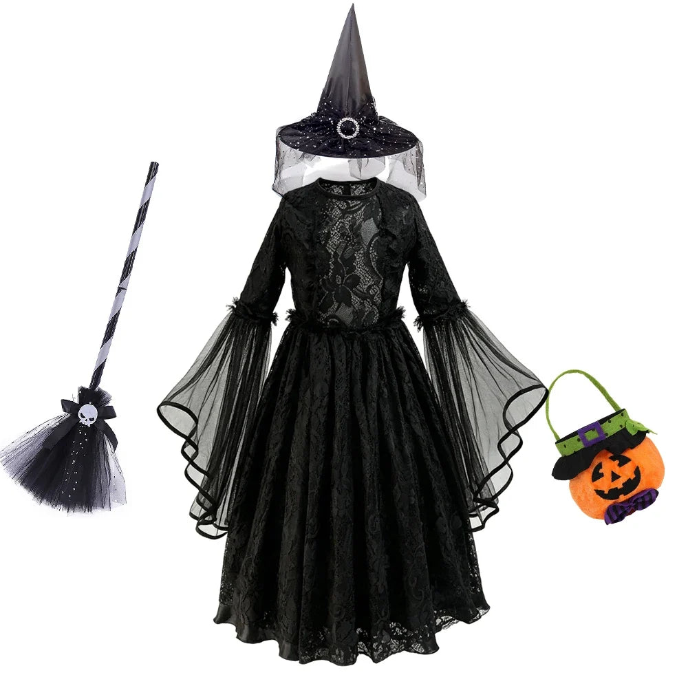 Black gothic lace dress with witch hat, broom, and pumpkin treat bag