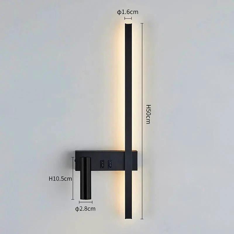 SVEA Swivel LED Wall Light black finish with slim vertical bar and reading arm mounted on bedroom wall.