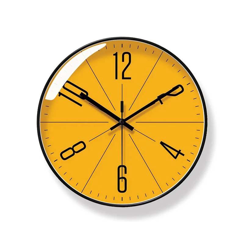 Wall Clock with yellow dial and black frame, shown on a white wall.