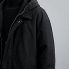 Kensington Overcoat — Black, studio construction detail