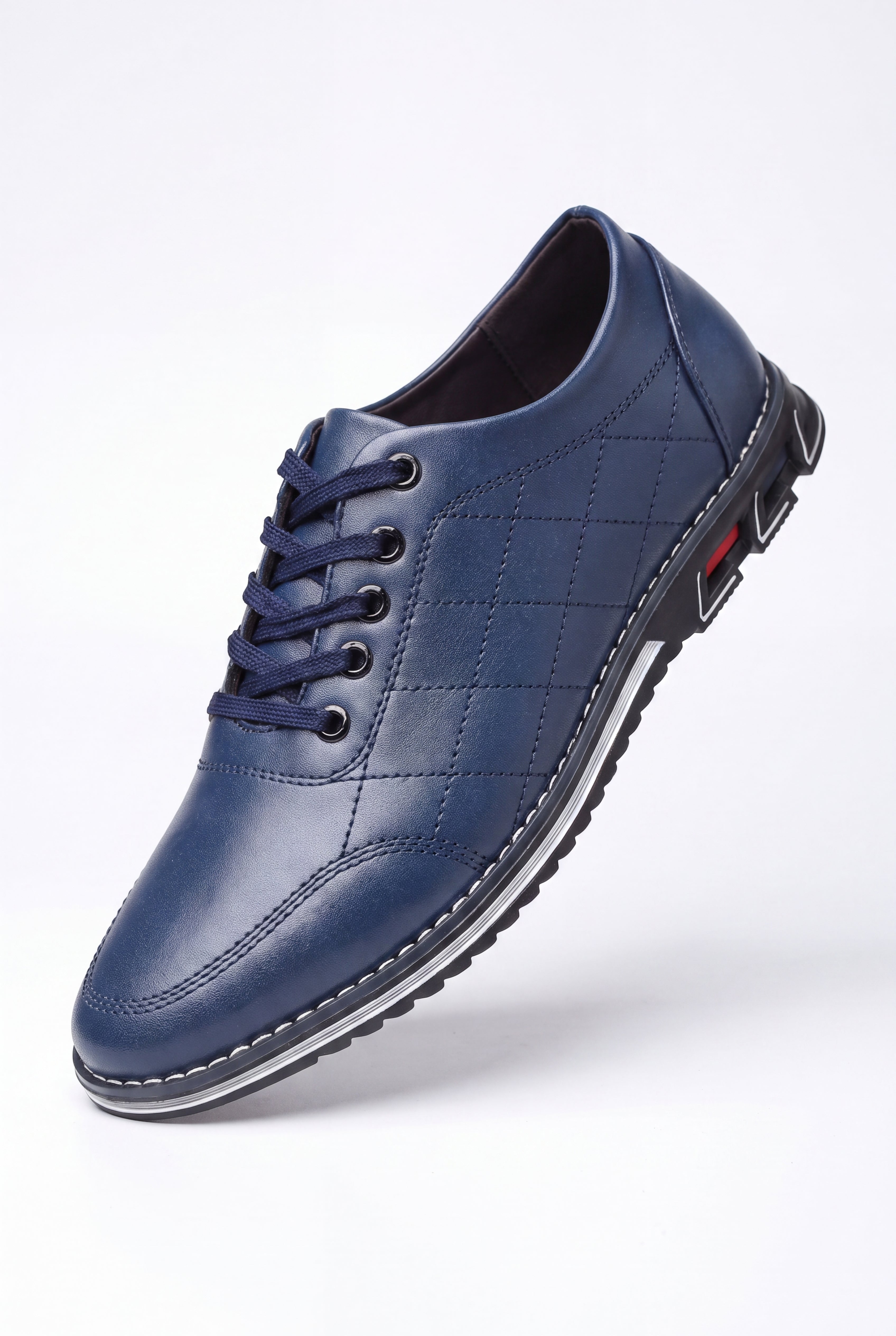 Men's Sneakers Quilted Low Top in Blue — clean packshot