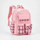 View of a stylish checkered school backpack featuring padded shoulder straps and a spacious compartment