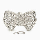 Elegant clutch bag in soft leather with a textured finish, featuring gold tone clasp and compact design — view 14 — view 14