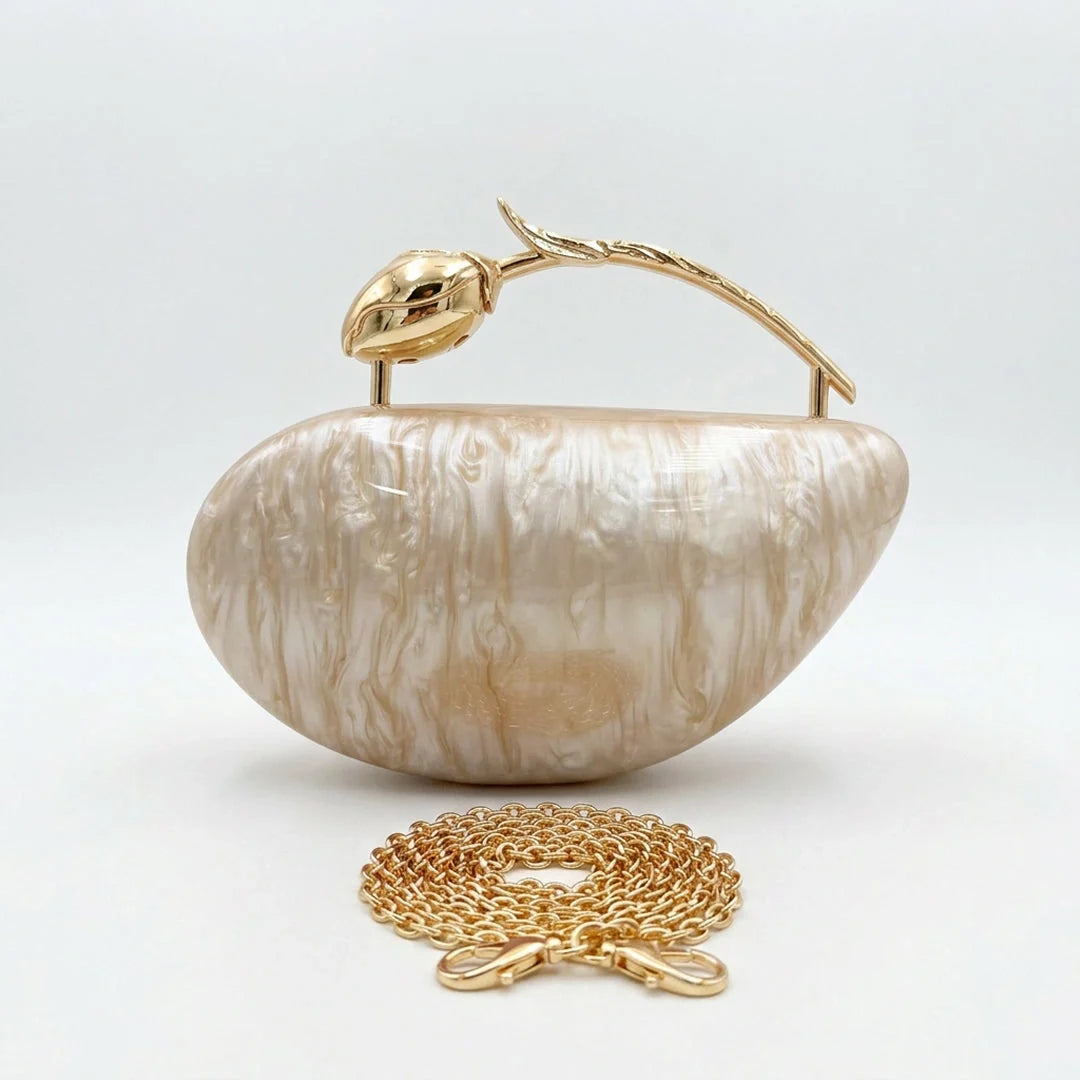 Clear acrylic clutch bag with a geometric design, featuring gold tone clasp and sleek, modern silhouette — view 17 — view 17