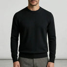 Fall sweater — Black lightweight cashmere crewneck long sleeves, shown on a person — view 7 — view 7