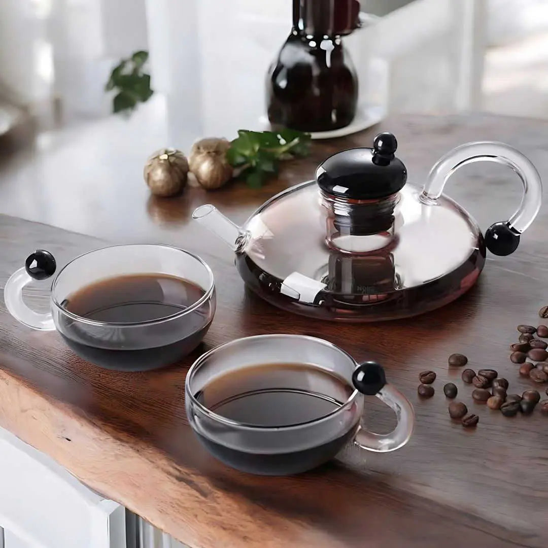 glass teapot set with cups in transparent