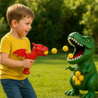 Enfant jouant avec le set de tir à la cible dinosaure