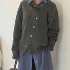 Loïs asymmetrisch knoop vest in grijze kleurvariant met tas