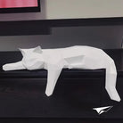 low-poly sleeping cat sculpture