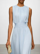 Close-up of ruched bodice on sleeveless A-line maxi dress