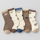 Vue à plat du lot de 5 paires de chaussettes d'hiver enfant motif ours, coloris marron, écru et bleu