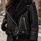 sherpa jacket — Women's Sherpa Lined Biker Jacket — Amira — Black — close up of the outer texture and pocket zipper — view 14