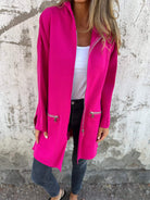 Xandra fuchsia longline vest met capuchon, vooraanzicht